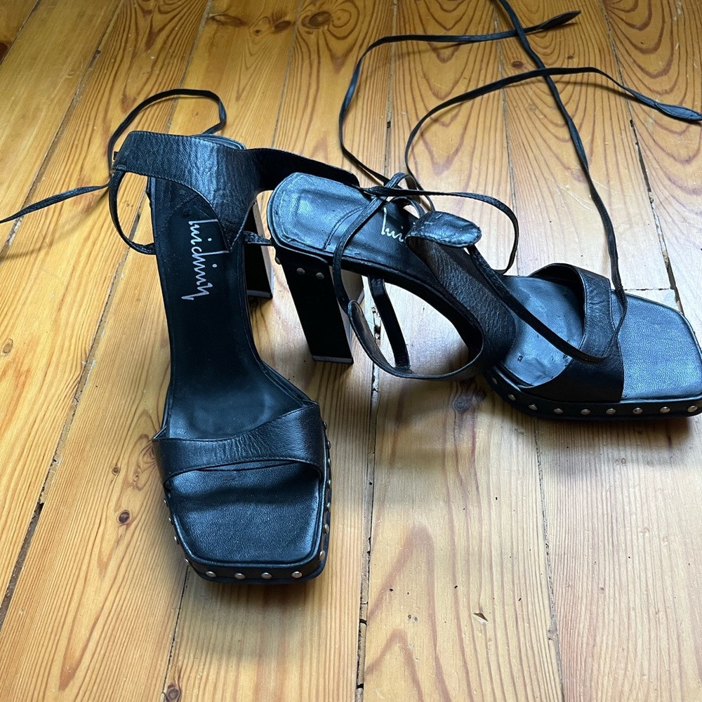 Lace up black sandals. Size 8. 3.5 inch heel.